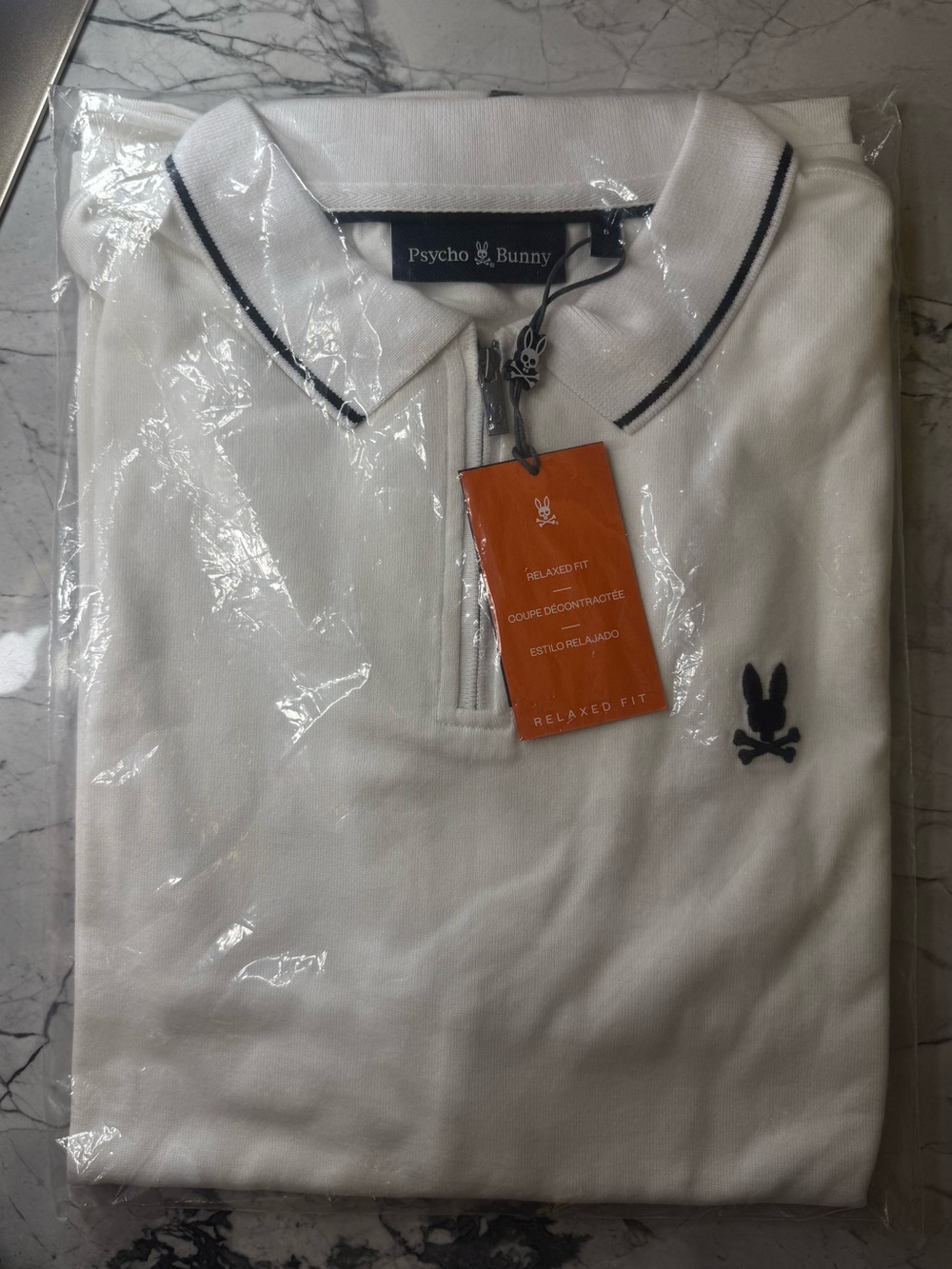 Psycho Bunny White Polo with Black Trim